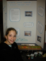 Shira with her science project Shira with her science project